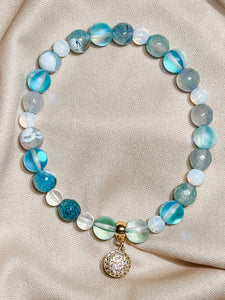 Pulsera de Cuarzo azulado y piedra luna con dije de perla tahitiana